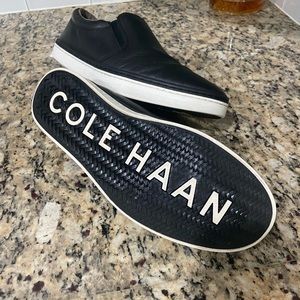 Black with white trim Cole Haan Slip-on dress shoes. Size 11 1/2 wide